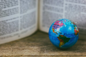 image of globe and the Bible next to it giving vision for generosity in missions