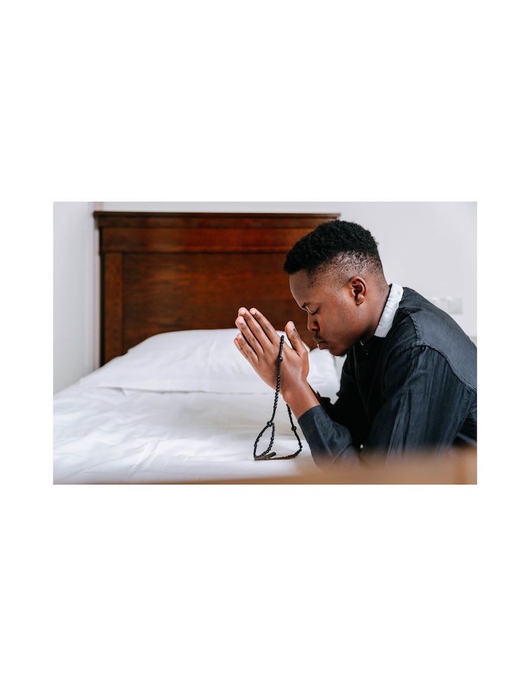 Christian in prayer committing to missions transformation after completing bible study on God's global purpose