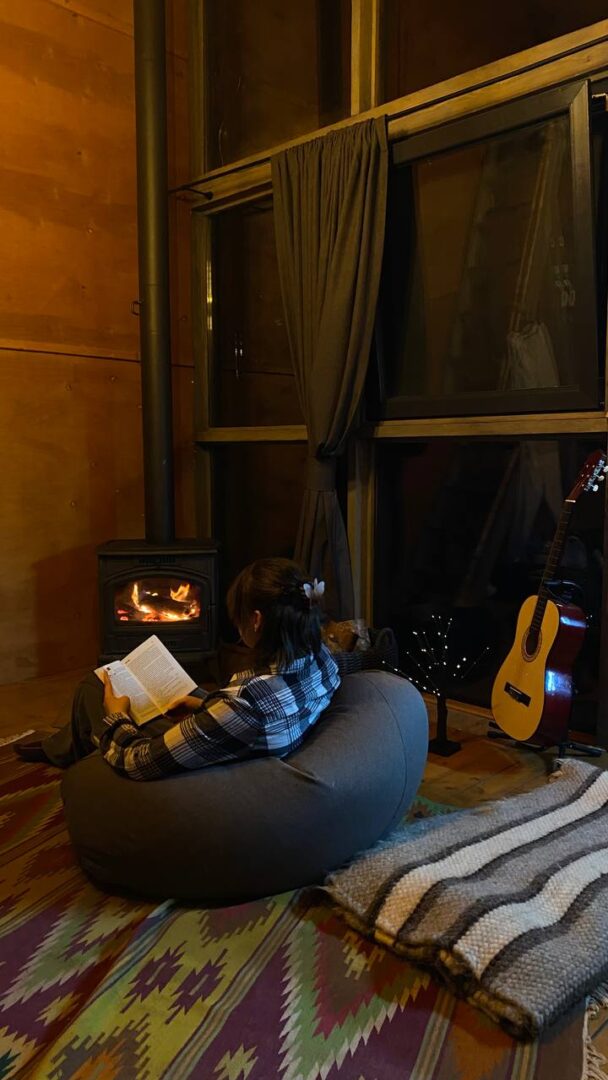 resting by the fireplace